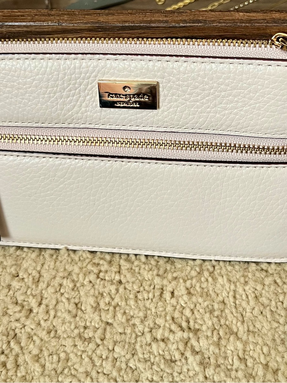 Small Kate Spade pinkish tan Leather Wristlet with Gold Hardware